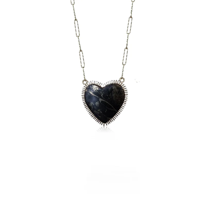 Radiant ladies necklaces with sapphires-14k Baguette Apache Heart Necklace