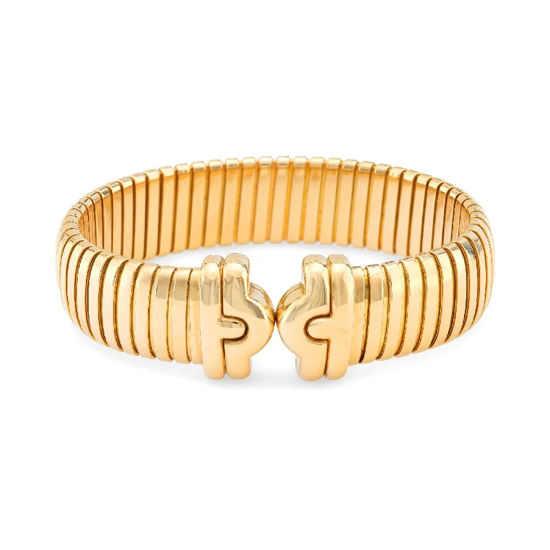 Stackable bangles for ladies-Bvlgari 18k yellow gold Parentesi Tubogas cuff bangle