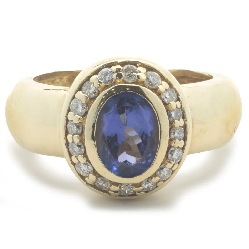 Engagement rings with moonstone accents-18 Karat Yellow Gold Tanzanite and Diamond Ring