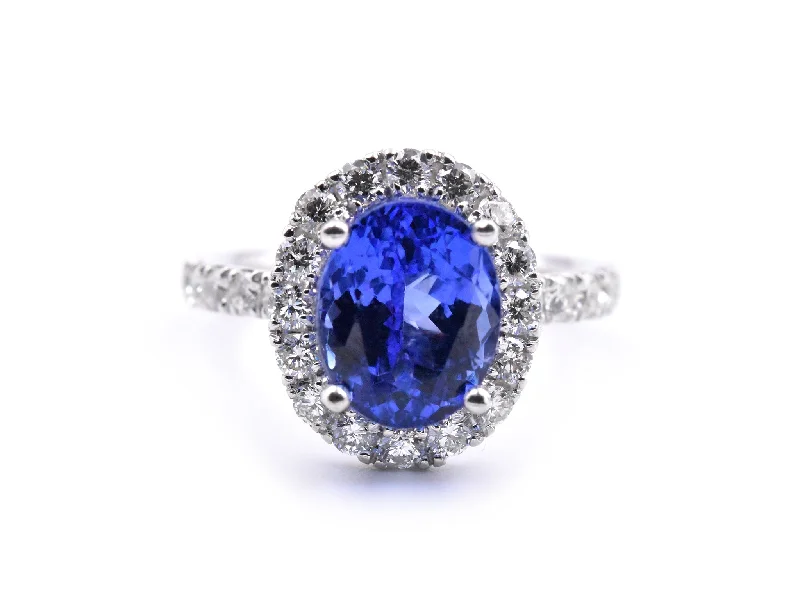 Affordable platinum engagement rings-14k White Gold Tanzanite and Diamond Halo Ring