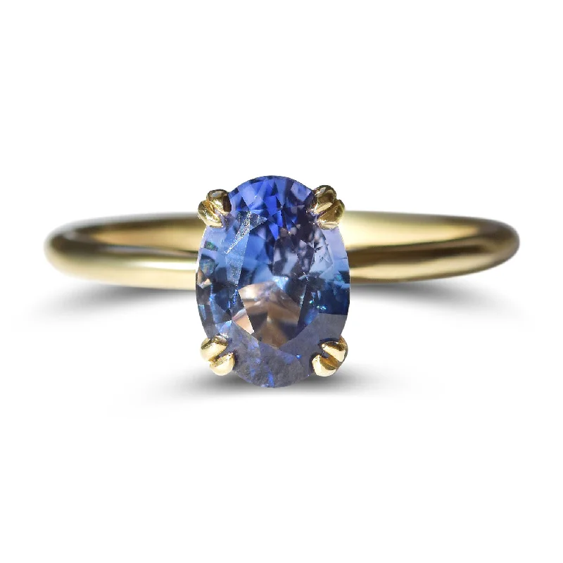 Personalized gemstone ladies rings-Lake Tahoe Sapphire Sunset Ring - Oval Blue Sapphire with Double Prong Setting in 14k Yellow Gold