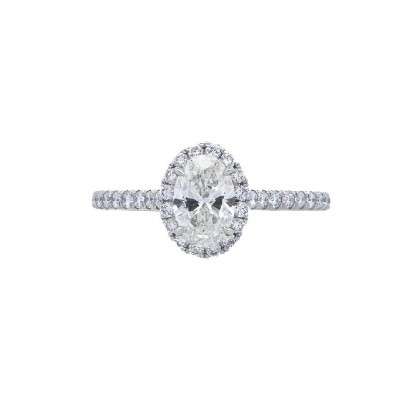 Sparkling engagement rings with cushion diamonds-Platinum Oval Diamond 0.70Ct Halo Engagement Ring