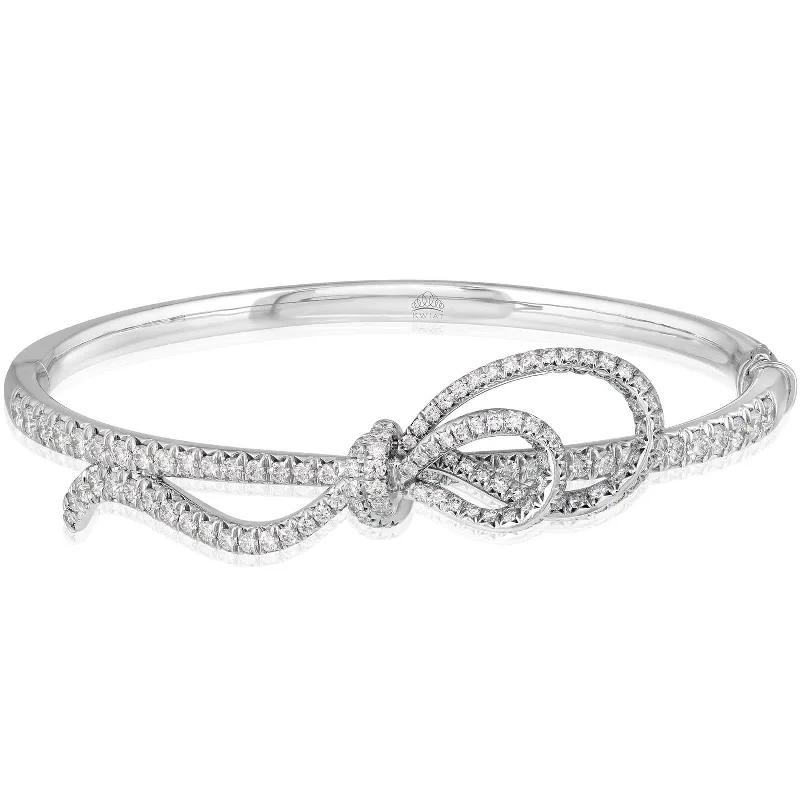 Modern ladies bangles with gemstones-KWIAT 2.3 Carat Diamond and Platinum Bow Bangle